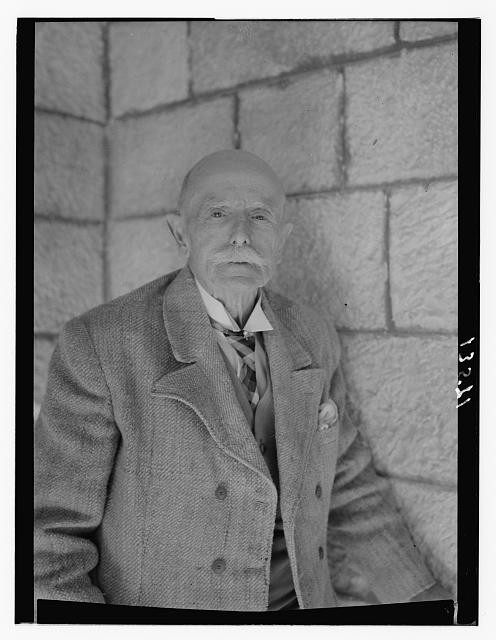 Photo:Mr Clark Portrait 1947 Elderly Man Suit Bow Tie Stone Wall