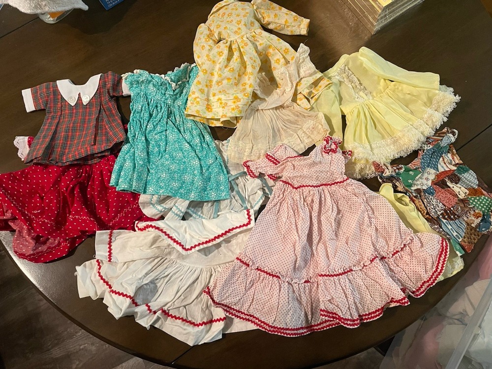10 Vintage Doll Dresses/outfits. Varies Sizes.