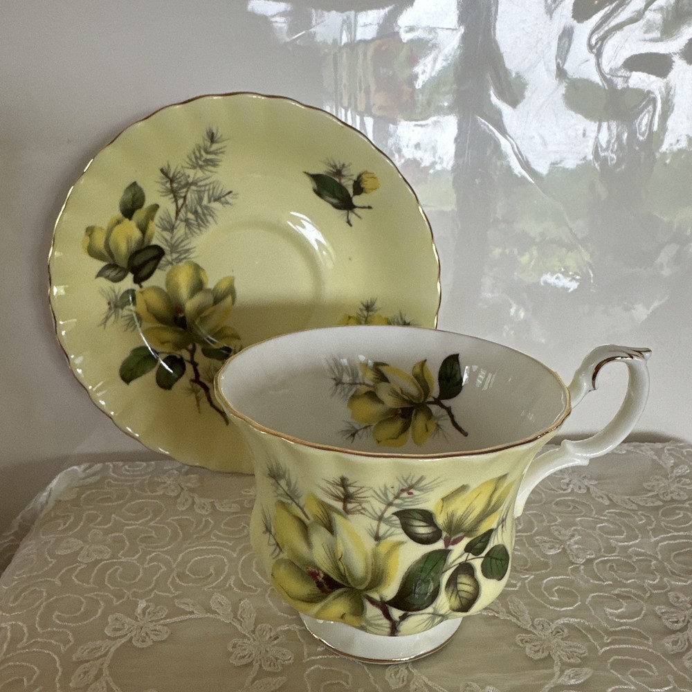 ROYAL ALBERT BONE CHINA YELLOW MAGNOLIA TEACUP AND SAUCER SET