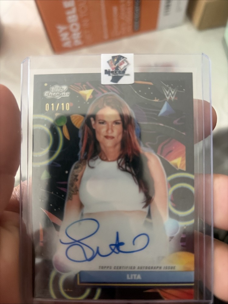 Lita 2026 Topps Cosmic Chrome WWE CCA-LTA BLACK  On card AUTO /10