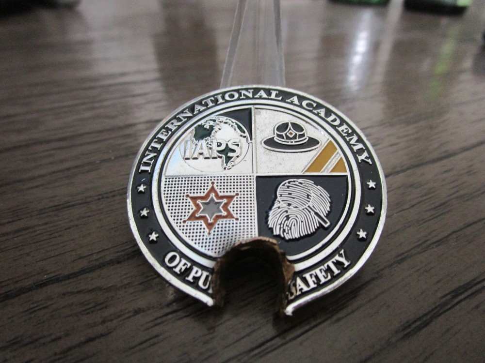 International Academy Of Public Safety With Actual Bullet Hole Challenge Coin-image