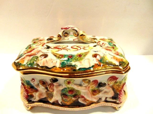 older Capodimonte Italian porcelain covered compote/ bowl with cherubs or putti