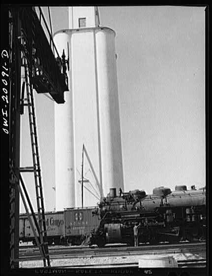 Kiowa, Kansas. Atchison, Topeka and Santa Fe Railroad engine stopping for water
