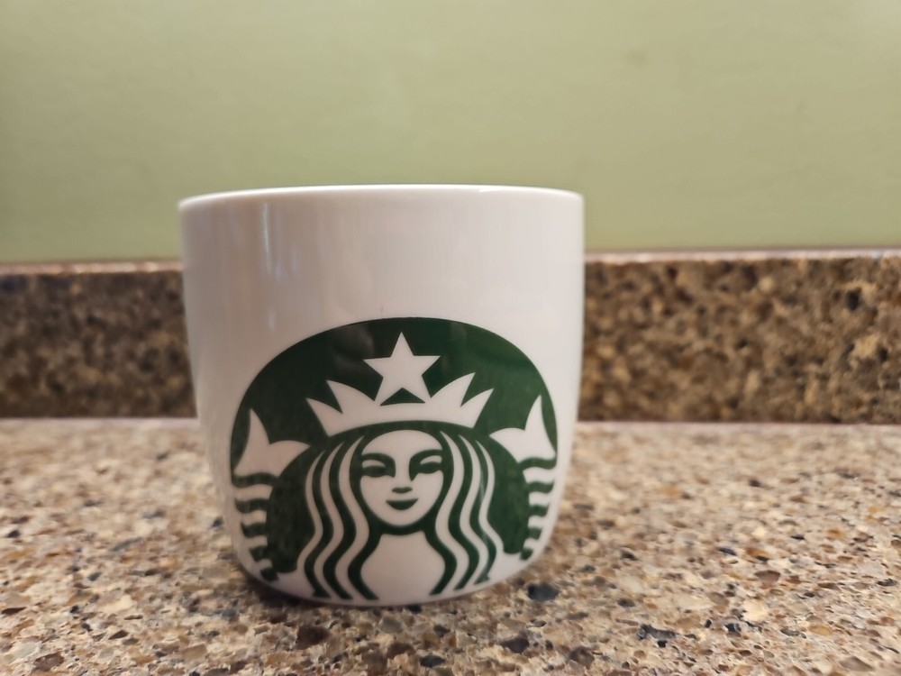 STARBUCKS Coffee Mug Green White Mermaid Logo Ceramic 16.9 Oz 2017