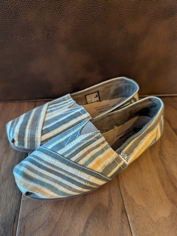 Bobs By Skechers Woman’s Slip On Shoes, Size 6, Gold tone shimmer/stripes