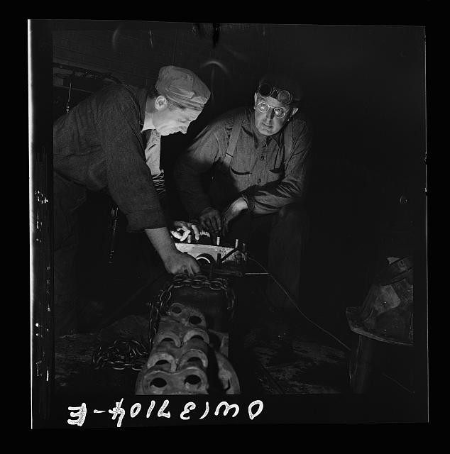 Photo:1940s Men Working with Machinery Headlamps Industrial Scene