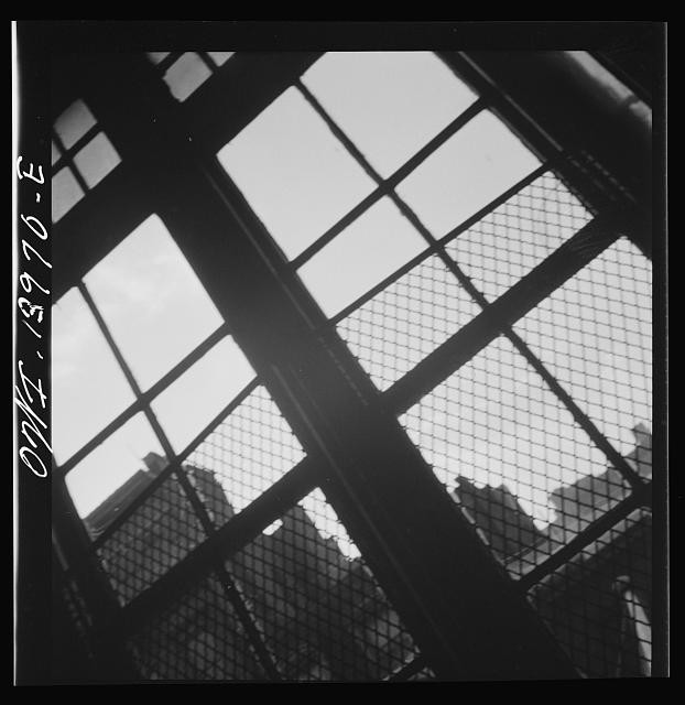 Photo:New York City 1940s Looking Through Fire Escape Window Grid Skyline
