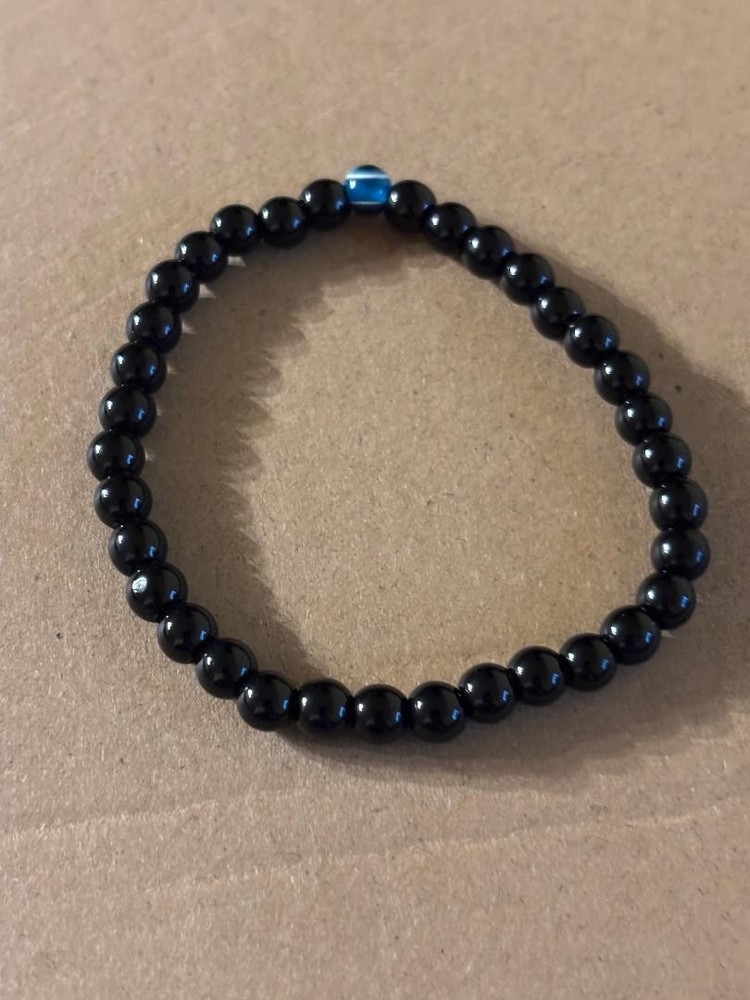 Evil eye beaded stretch bracelet.