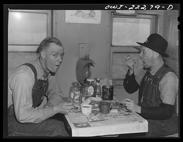 Photo:Farmers Eating Breakfast 1930s Overalls at Kitchen Table