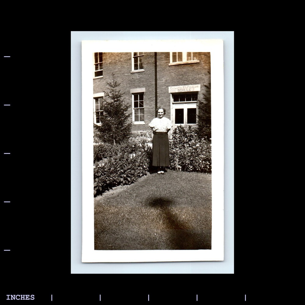 Vintage Photo WOMAN STANDING BY BUILDING