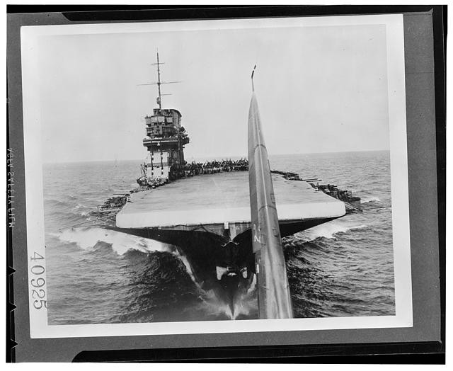 Photo:Aircraft Carrier at Sea 1940s Navy Deck Plane Rear View