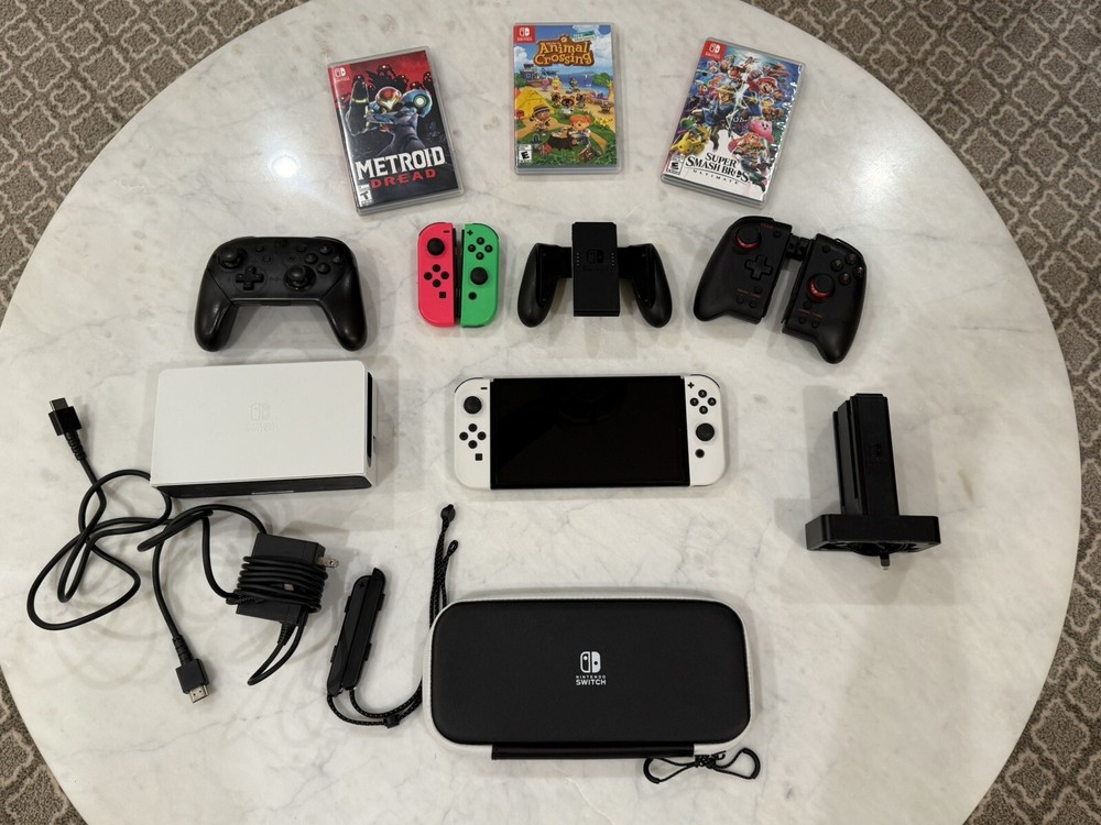 Nintendo Switch OLED Model Ultimate Bundle (controllers, games, case, etc)
