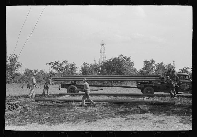Photo:Seminole Oklahoma 1939 Oil Well Pipe Unloading Truck Workers