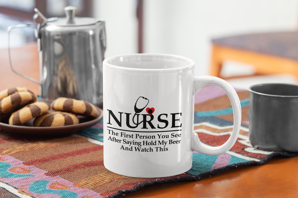 Nurse Funny Coffee Mug Nurse The First Person You See After Saying Hold My Beer