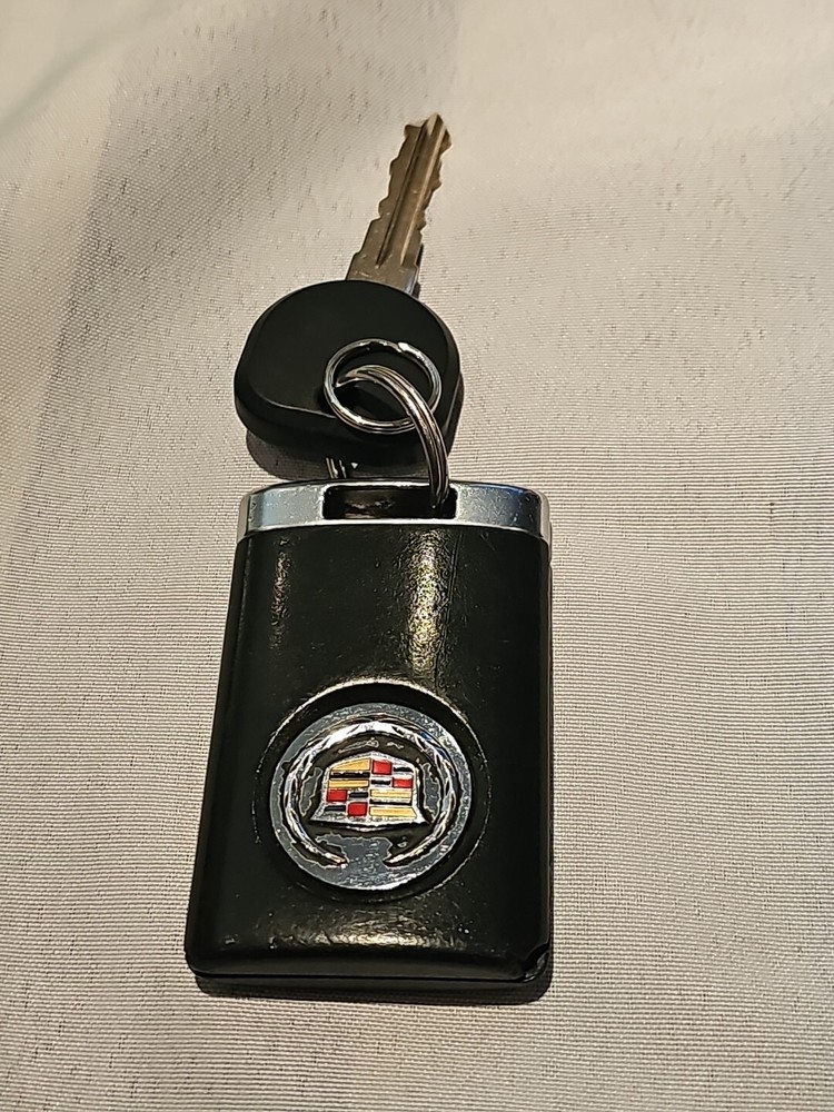 ORIGINAL CADILLAC DTS CTS 08-13 REMOTE KEY LESS ENTRY FOB DRIVER#1 USA ALARM GM