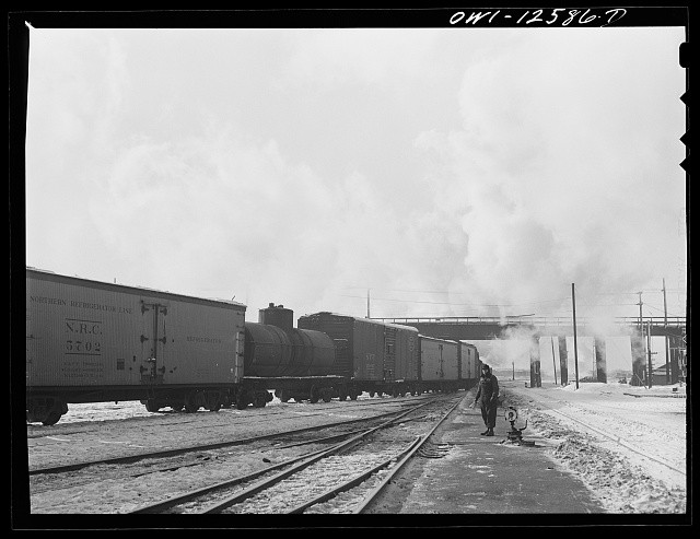 Photo:Snowy Railroad Freight Train Man Walking 1930s-1940s Trackside