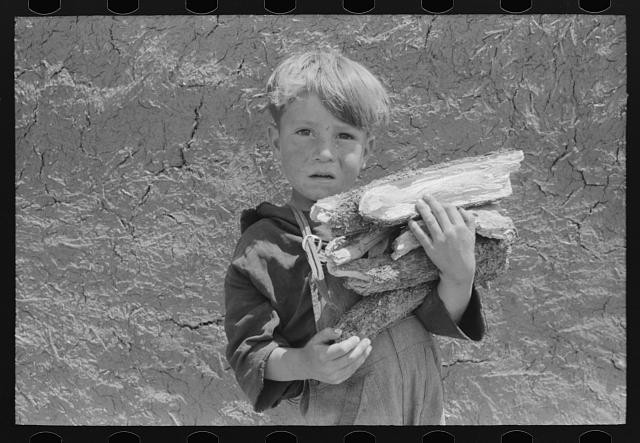 Photo:Chamisal New Mexico Spanish-American Boy with Wood 1940