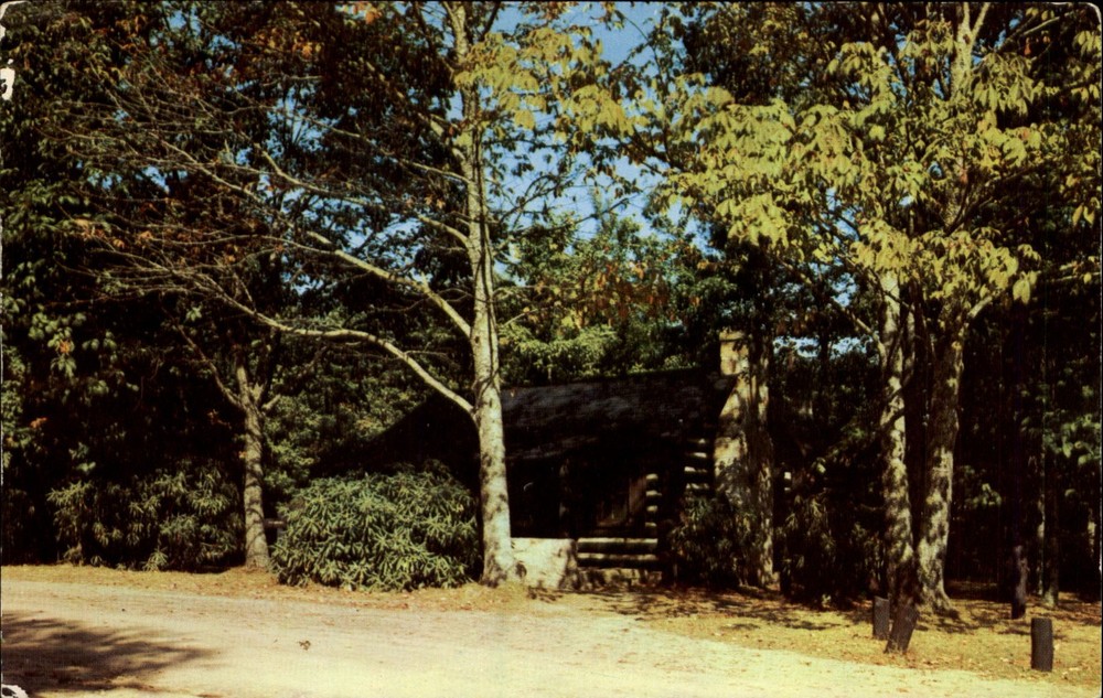Log cabin in West Virginia State Park ~ 1960s vintage postcard