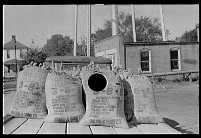 Cotton Storeyard,Enfield,North Carolina,NC,April 1938,John Vachon,FSA,1