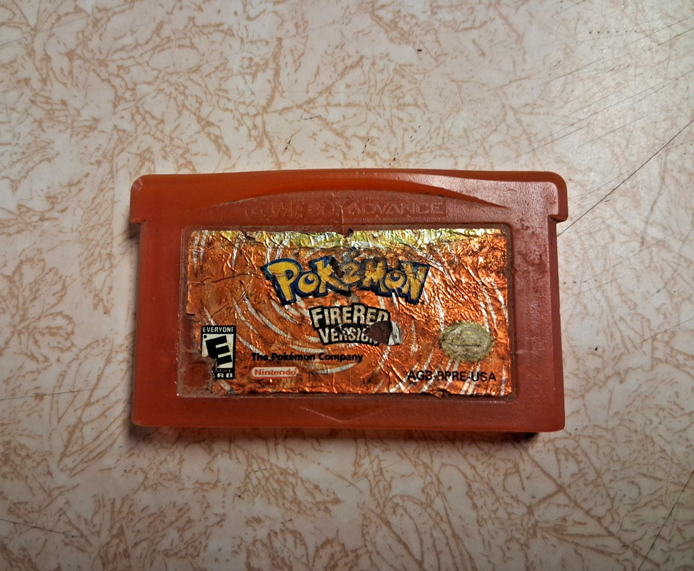 Authentic Pokemon: FireRed Version (Nintendo Game Boy Advance) (LABEL DAMAGED)