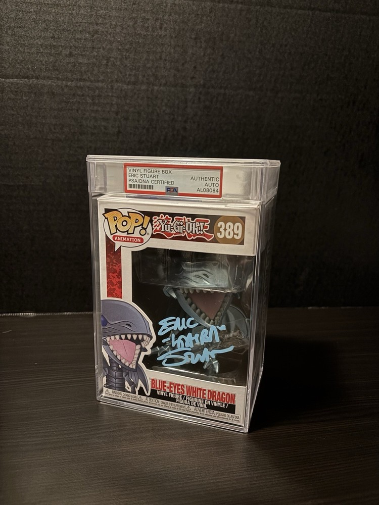 PSA Encapsulated Eric Stuart Signed Yu-Gi-Oh Funko Pop! Blue-Eyes White Dragon