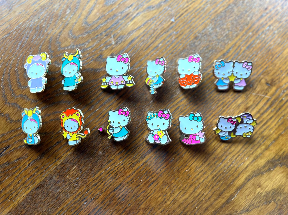 12 Hello Kitty Star Signs Pins, New and Unused