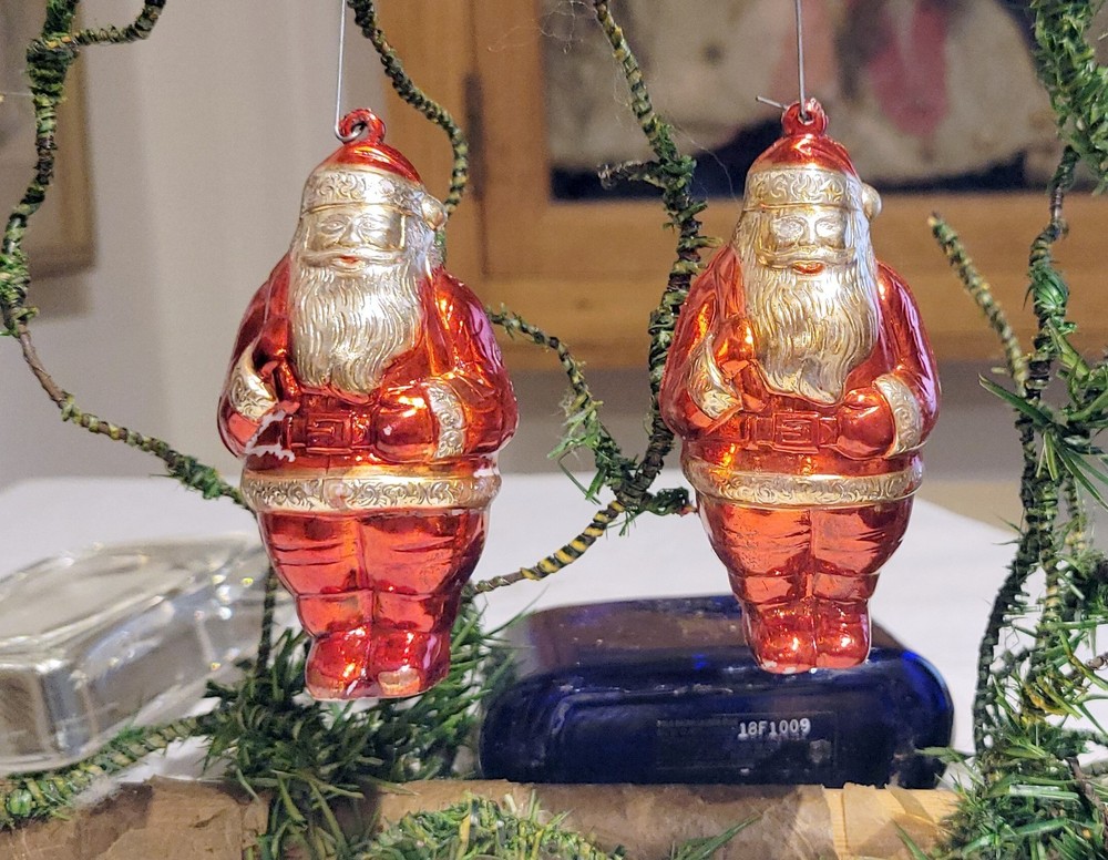 Two hard plastic silvered Santa Claus Ornaments. 1947. USA. Red Suits