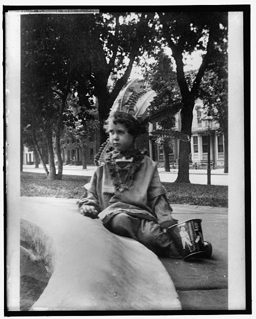Photo:Miss Z. Tarrant,Child wearing headdress,Harris & Ewing