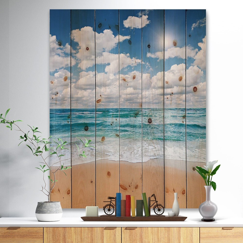 Designart 'Peaceful Seashore Under White Clouds' Nautical & Coastal Wood Wall