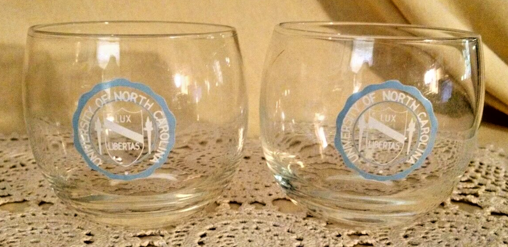 UNIVERSITY NORTH CAROLINA GLASS SET 2 ROUNDED ROCK LUX LIBERTAS LIGHT BLUE WHITE