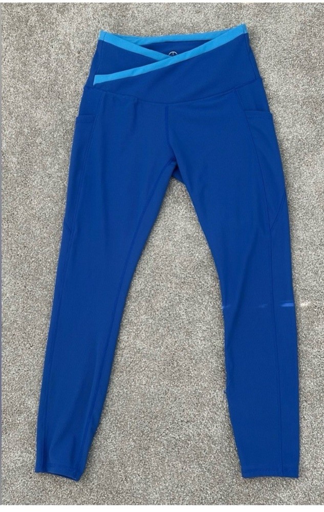 Move Theology Blue Crossover Waist Leggings w/pockets. Women’s s size: M