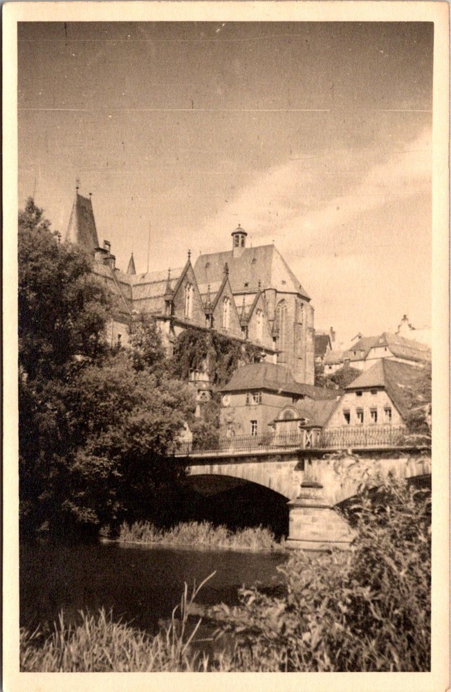 Vintage Postcard of Scenic River Bridge and Historic Architecture