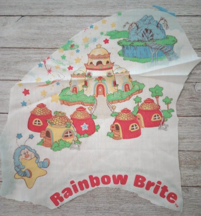 rainbow brite castle logo fun fabric buddy blue scrap piece 10 by 9 inch 1pc
