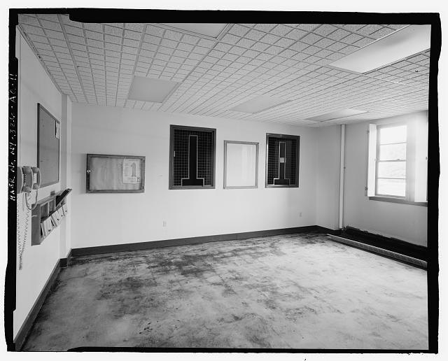 INTERIOR OF HOLDING ROOM. VIEW TO NORTHEAST. - Plattsburgh Air Force Base,