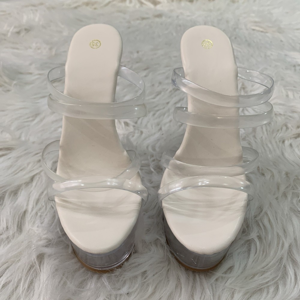 Clear 6-inch platform mule heels in size 5.5