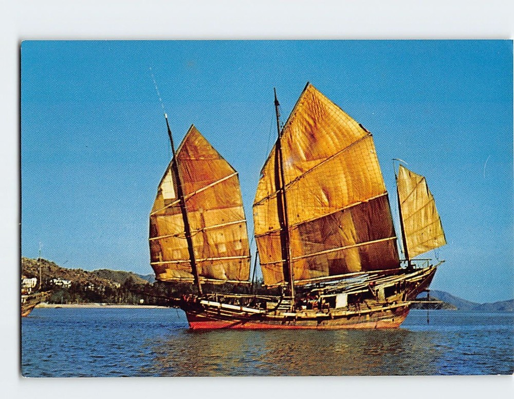 Postcard One of the thousands of junks cruising in Hong Kong Harbour China