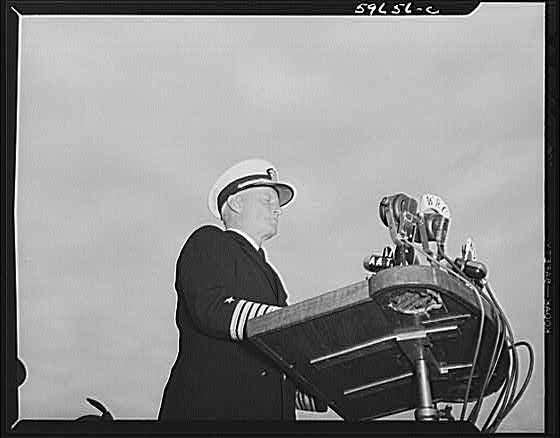 Photo:Unknown location 1940s Naval Officer Speaking at Podium Microphones