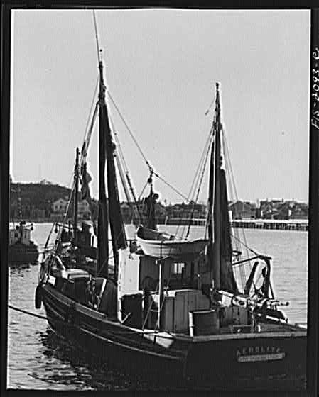 Photo:Fishing Boat Harbor 1910s Sailboat Docked in Waterfront Town