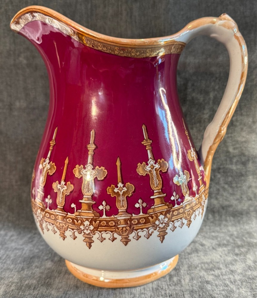 Likely Thomas Furnival & Sons Gothic Revival Water Pitcher Maroon Caramel Lustre