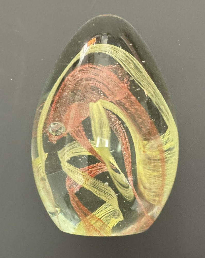 Art Glass Egg Shape Paperweight Clear with a Yellow and Salmon Abstract  Design-image
