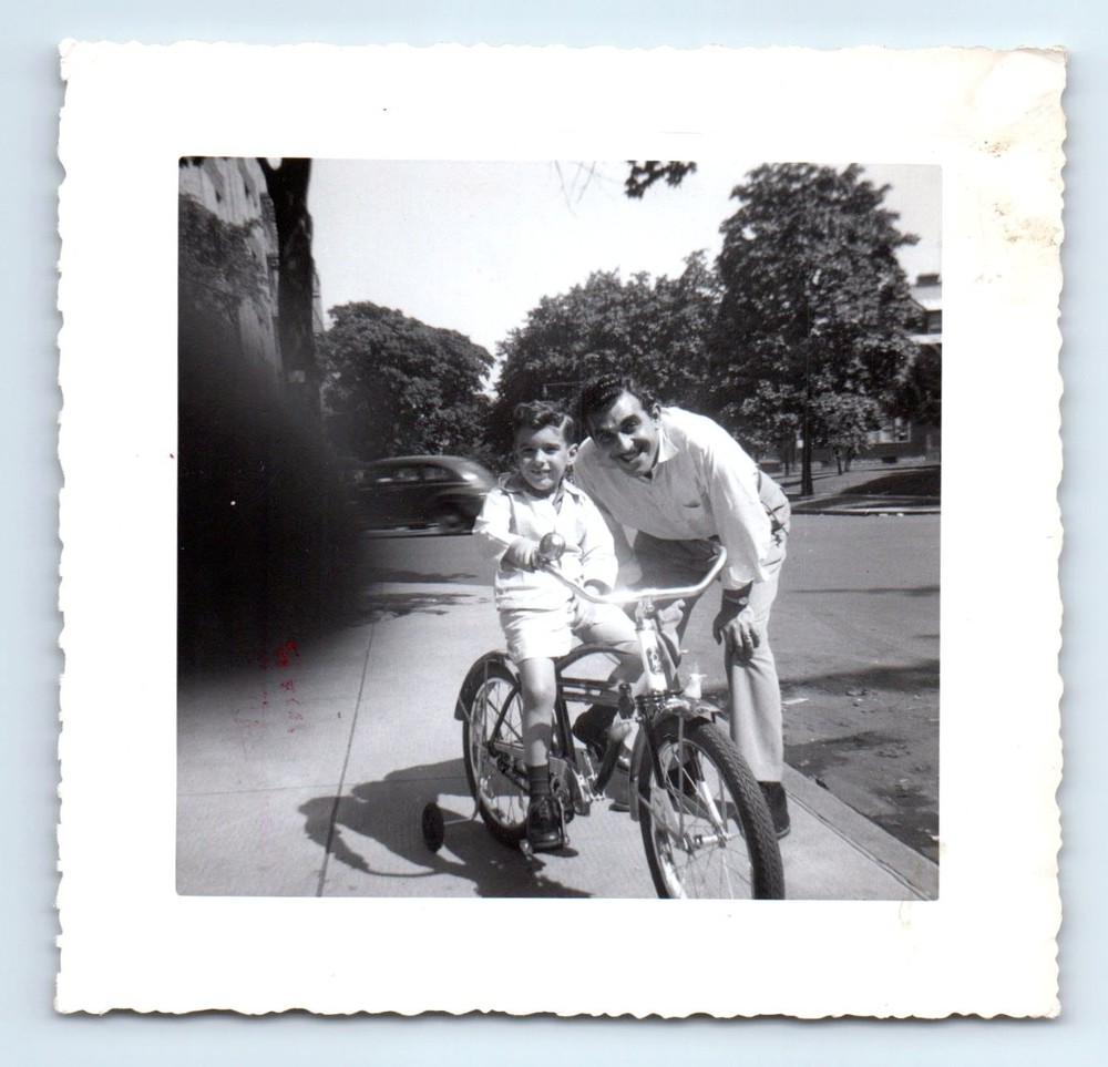 Old Vintage Photo MAN AND BOY RIDING BICYCLE FINGER IN FRAME ABTRACT SNAPSHOT