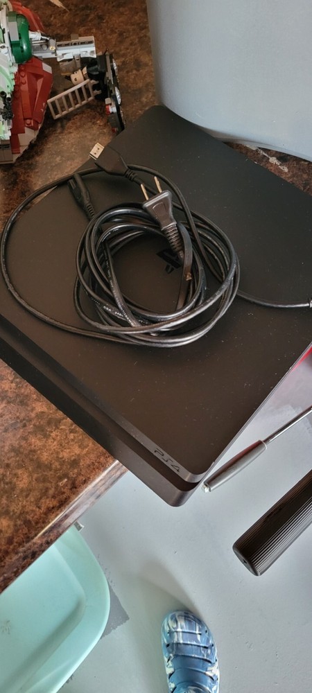 Sony PS4 Slim 500GB Black Gaming Console with DualShock Controller