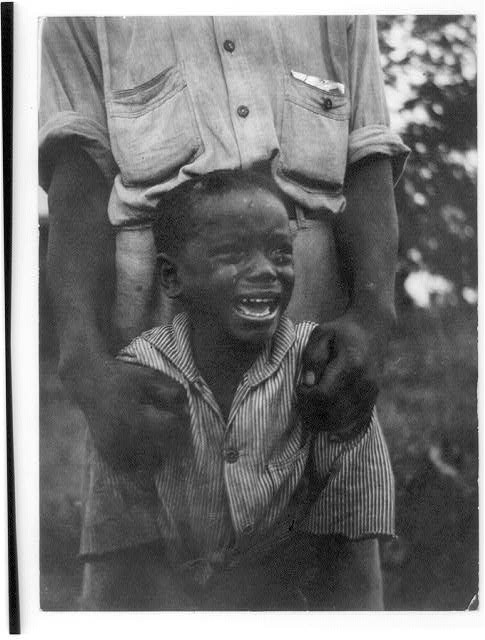 Photo:Young boy, crying, African American