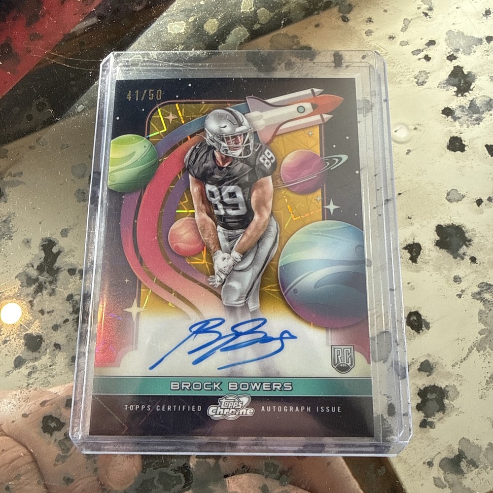 2024 Topps Cosmic Chrome #FFS-BB Brock Bowers First Flight Auto Gold #/50 Rookie