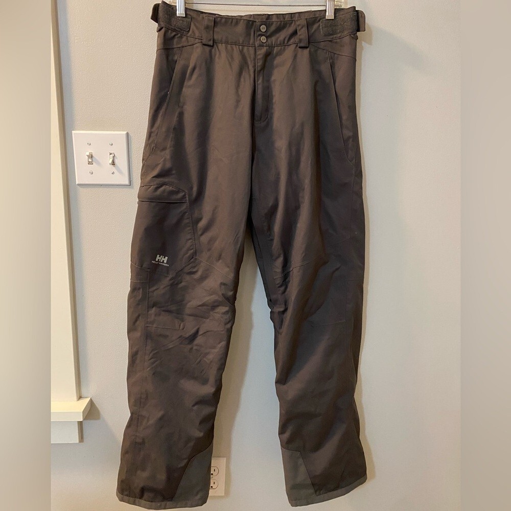 Helly Hansen medium insulated dark grey snow pants. Adjustable waist and pockets
