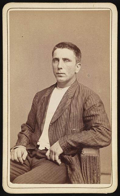 Photo:Vincent Palermo, half-length portrait, seated, facing slightly left