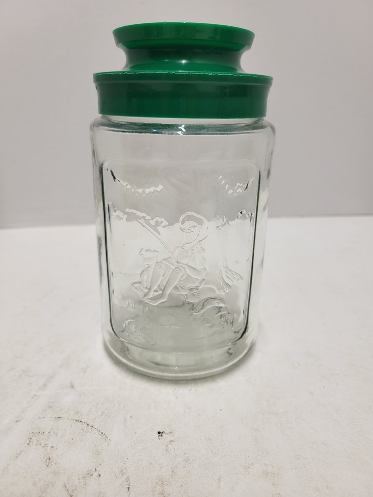 Anchor Hocking Glass Spring Embossed Tang Storage Jar Green Lid Vintage