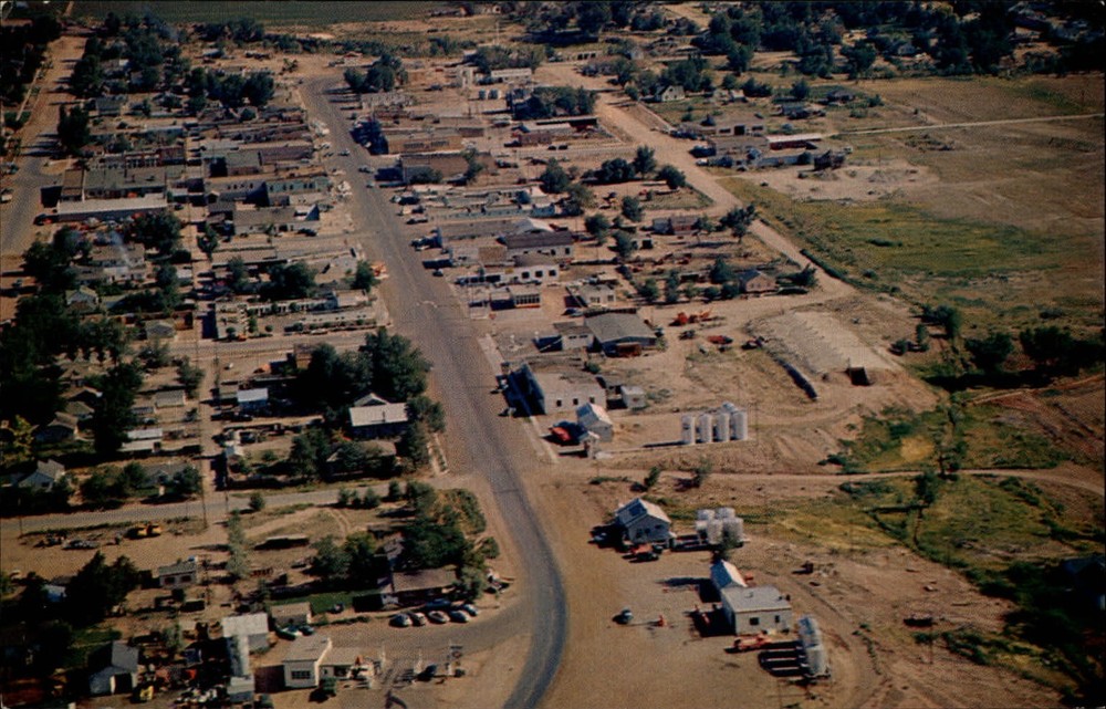 Roosevelt Utah UT ~ aerial view business district gas stations ~ 1950s postcard