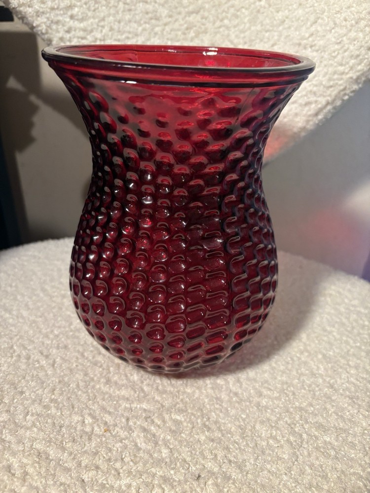 Vintage ruby red glass vase with a textured, reverse hobnail/dimpled pattern