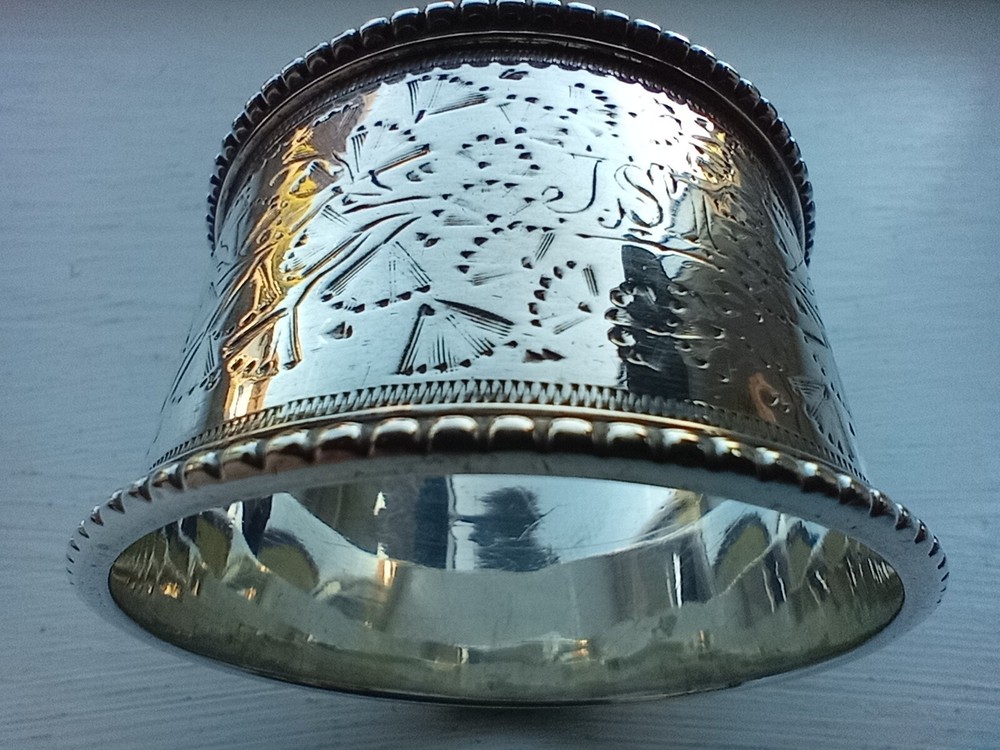 31 gramme perfect and ornate 1897 solid silver Sheffield napkin ring